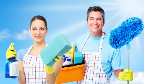 Staff member reviewing safety measures before a cleaning task